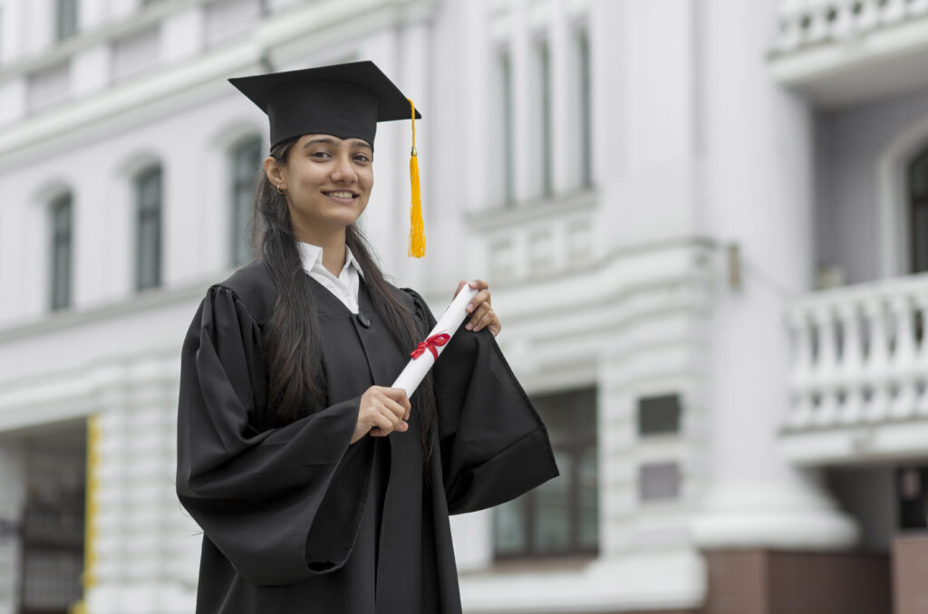 a girl holding a post graduate certificate